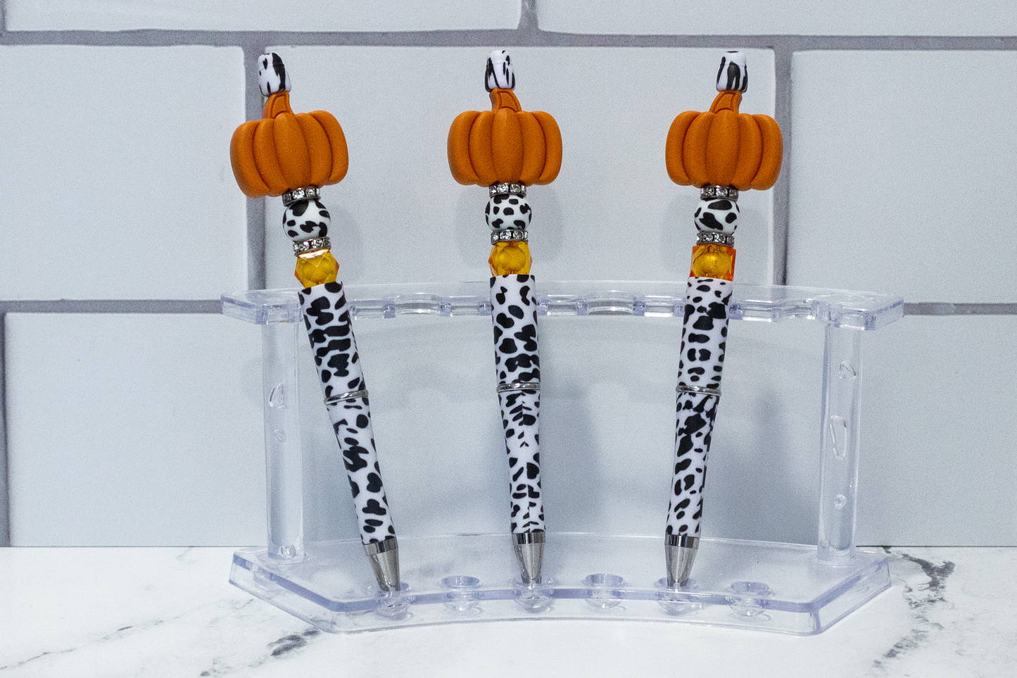 Pumpkin on a Cow Printed Beaded Pen